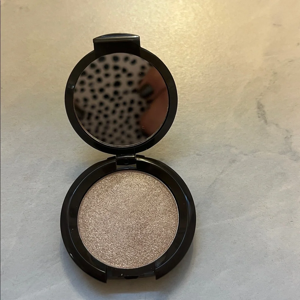 BECCA shimmering skin perfector pressed powder compact opal